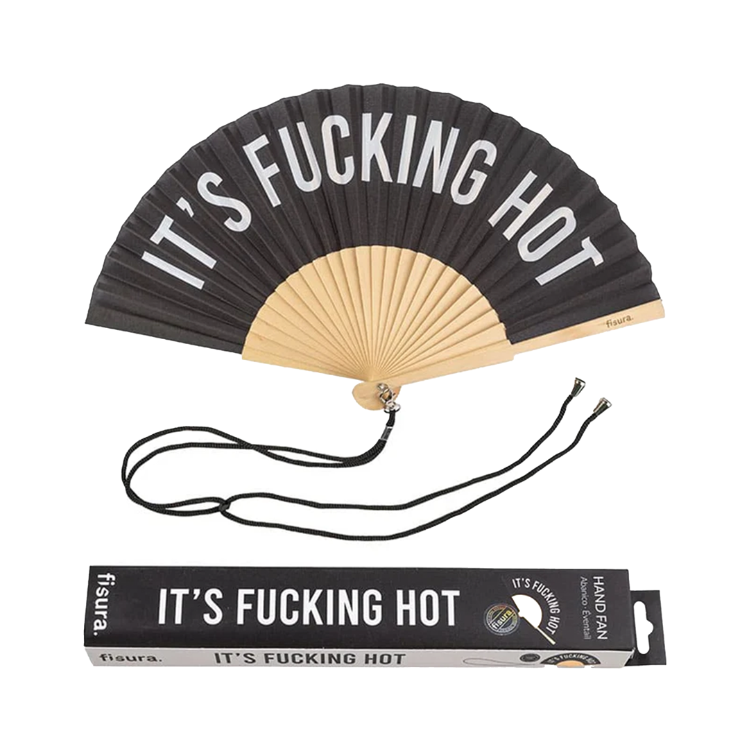 Opened black fan emblazoned with the words "It's fucking hot" above a matching stylish box.