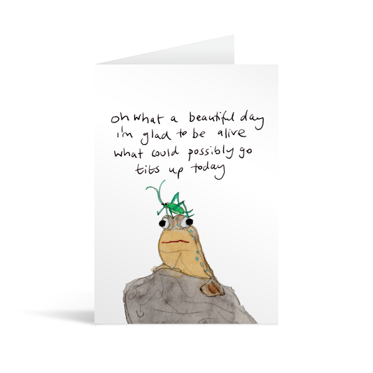 A white rectangular card with a cute hand illustrated mudskipper with a cricket on his head and funny text saying "oh what a beautiful day I'm glad to be alive what could possibly go tits up today"