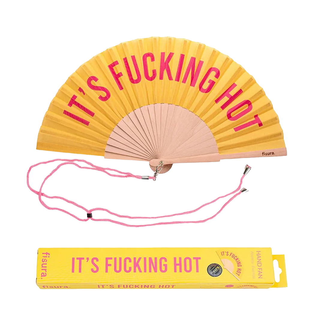 Opened yellow fan emblazoned with the pink words "It's fucking hot" above a matching stylish box.