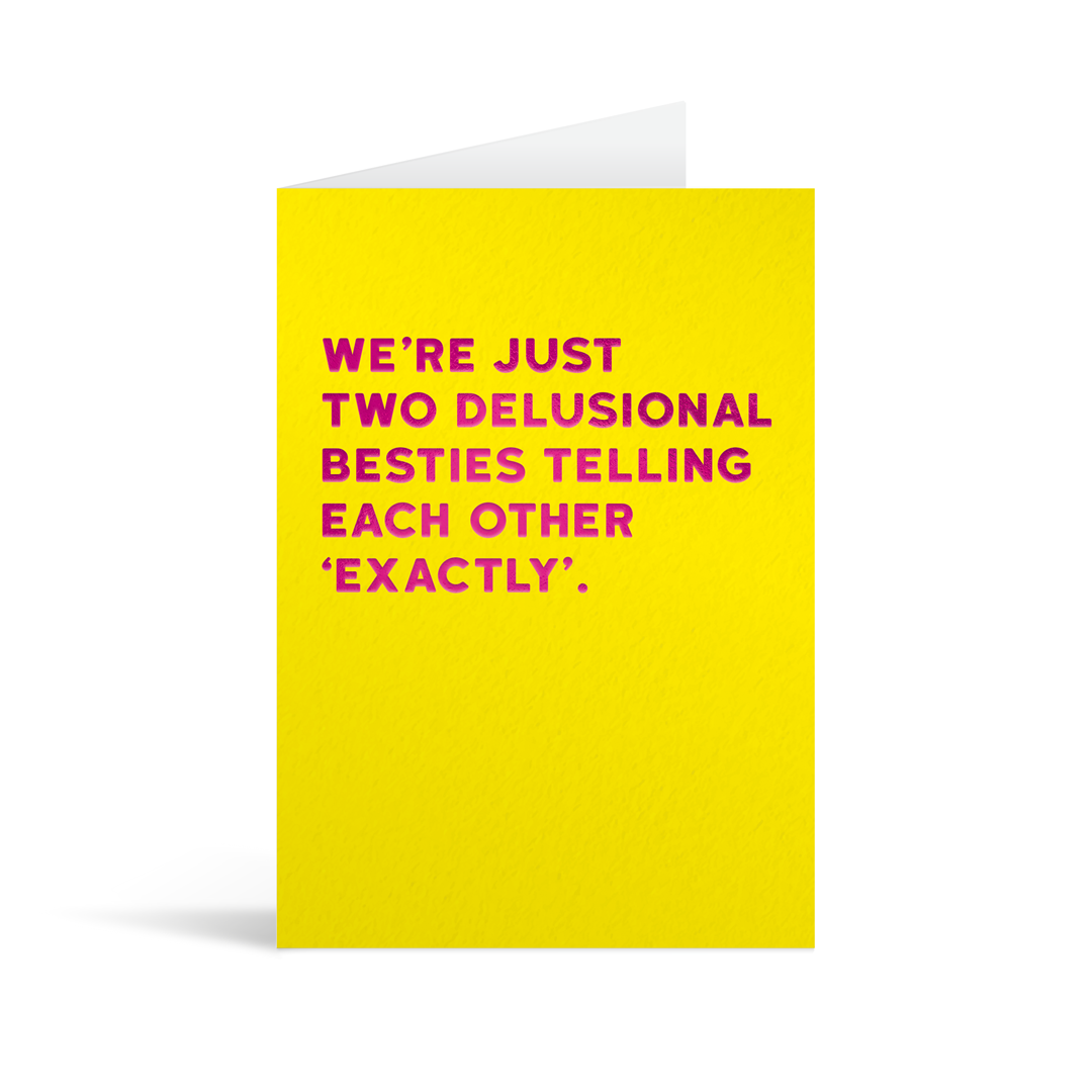 Yellow card with fuscia foiled text that reads "We're just two delusional besties telling each other exactly."