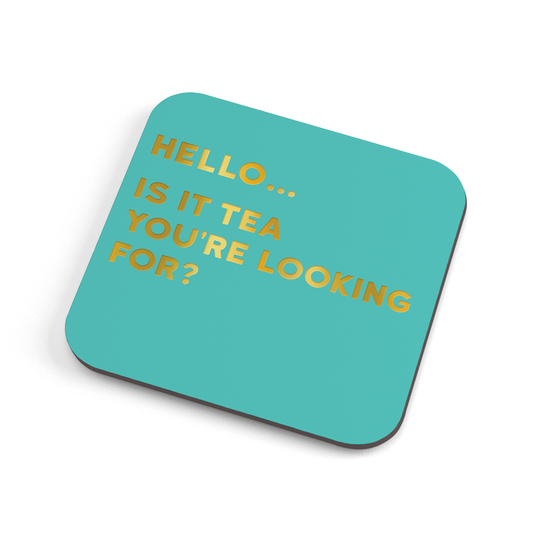 A funny (colour) coaster with gold foiled text saying: "Hello… is it tea you're looking for?"