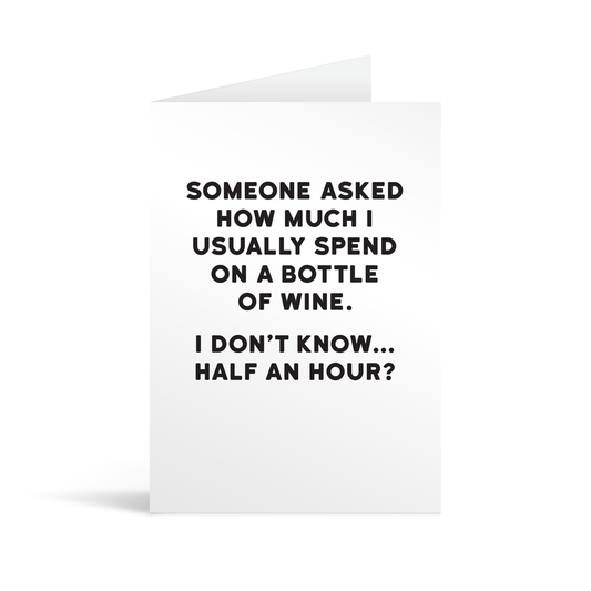 White rectangular card with black text saying: "Someone asked how much I usually spend on a bottle of wine. I don't know… half an hour?"