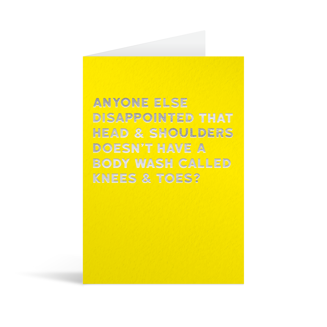 Yellow rectangular card with silver foiled text saying "anyone else disappointed that head & shoulders doesn't have a body wash called knees & toes? "