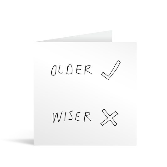 Messy and funny handwritten style card with the word Older with a big tick next to it, and underneath the word wiser with a big cross