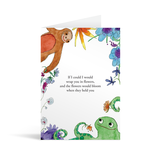 White rectangular card with a playful, childlike illustration of animals and flowers around the border, and the centralise typed text which reads "If I could I would wrap you in flowers and the flowers would bloom when they held you." Brown envelope in the background.