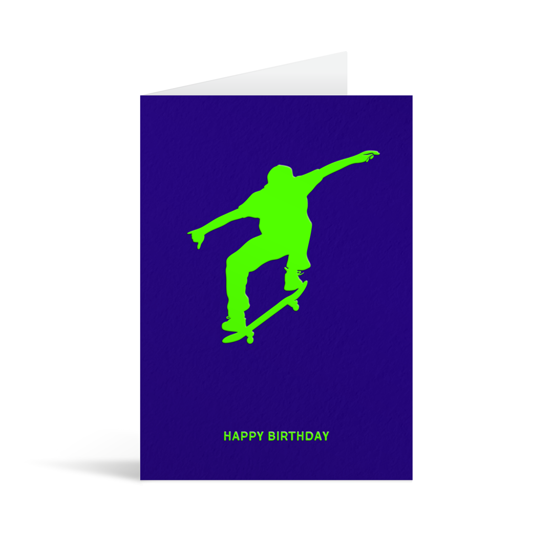 Blue card with neon green sillhouette of a skateboarder in mid air above text that reads Happy Birthday