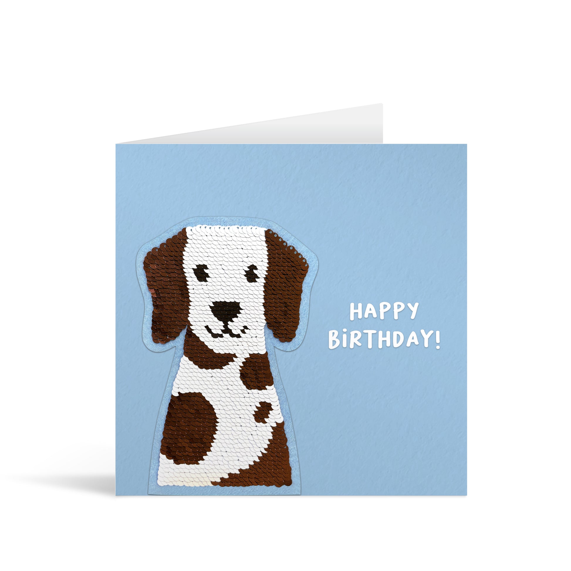 Pale blue square greetings card with cute reversible sequin brown and white dog patch and fun, free-flowing text that reads "Happy Birthday!"