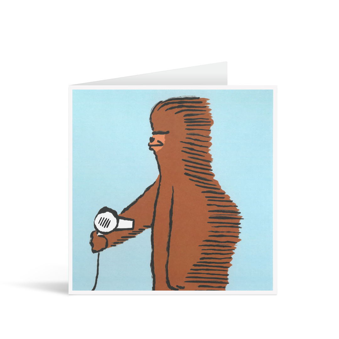 Pale blue card with a humorous image of Chewbacca giving himself a blow dry. His fur streams out behind him. 