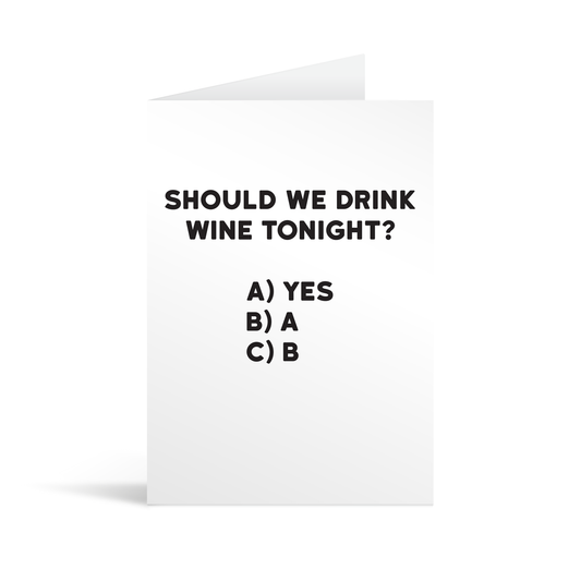 White rectangular card with black text saying: " Should we drink wine tonight? A) Yes, B) A, C) B."