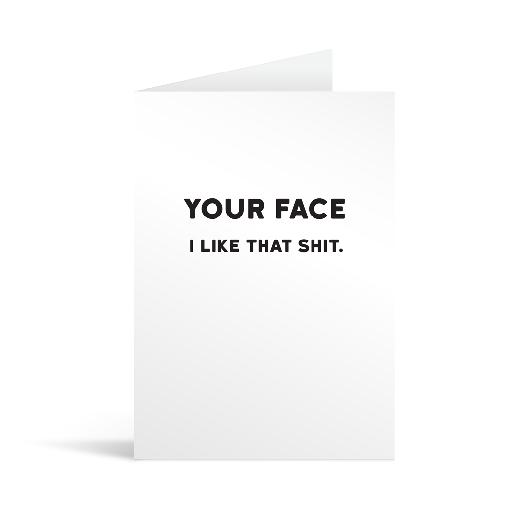 White rectangular card with black bold text reading "Your face. I like that shit." Neon orange envelope in the background.