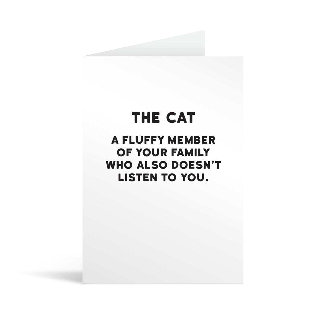 White rectangular card with black text saying: "The cat: A fluffy member of the family who also doesn't listen to you."