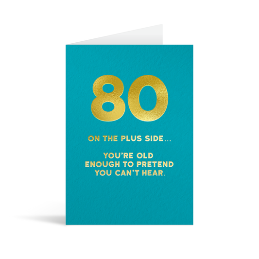 Teal card with large gold foiled number 80 and text that reads "On the plus side… you're old enough to pretend you can't hear."