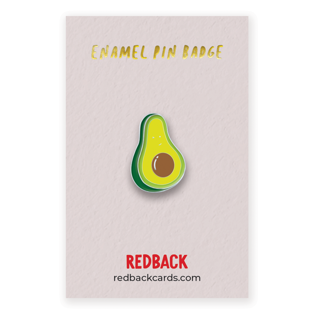 A cute avocado enamel pin mounted on card