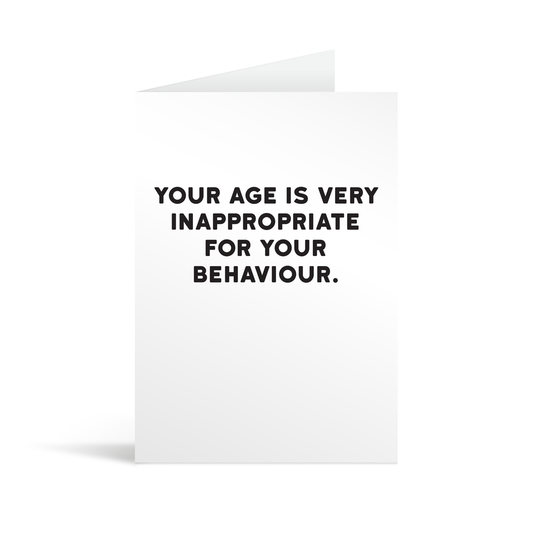 White rectangular card with funny black text saying: "Your age is very inappropriate for your behaviour."