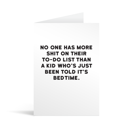 White rectangular card with black text saying: "No-one has more shit on their to-do list than a kid who's just been told it's bedtime"