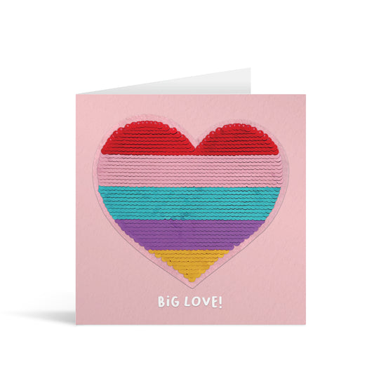 Pink square greetings card with colourful shiny sequin heart reversible patch and fun, free-flowing text that reads "Big Love!"