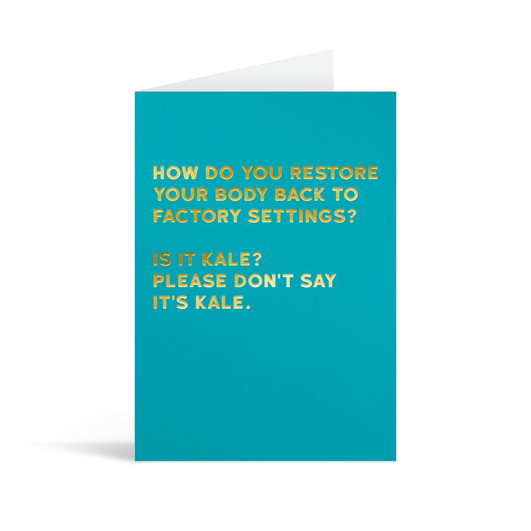 Turquoise rectangular card with gold foiled text saying: "How do you restore your body back to factory settings? Is it kale? Please don't say it's kale."