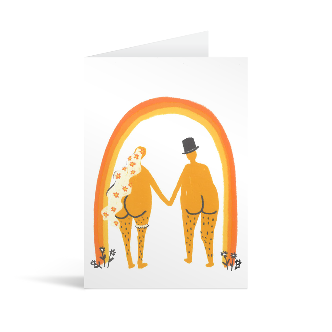 Wedding card with an autumnal rainbow under which are standing a naked couple painted from behind, with cute bottoms. One wears a hat and the other has flowing long hair and wears a garter. 