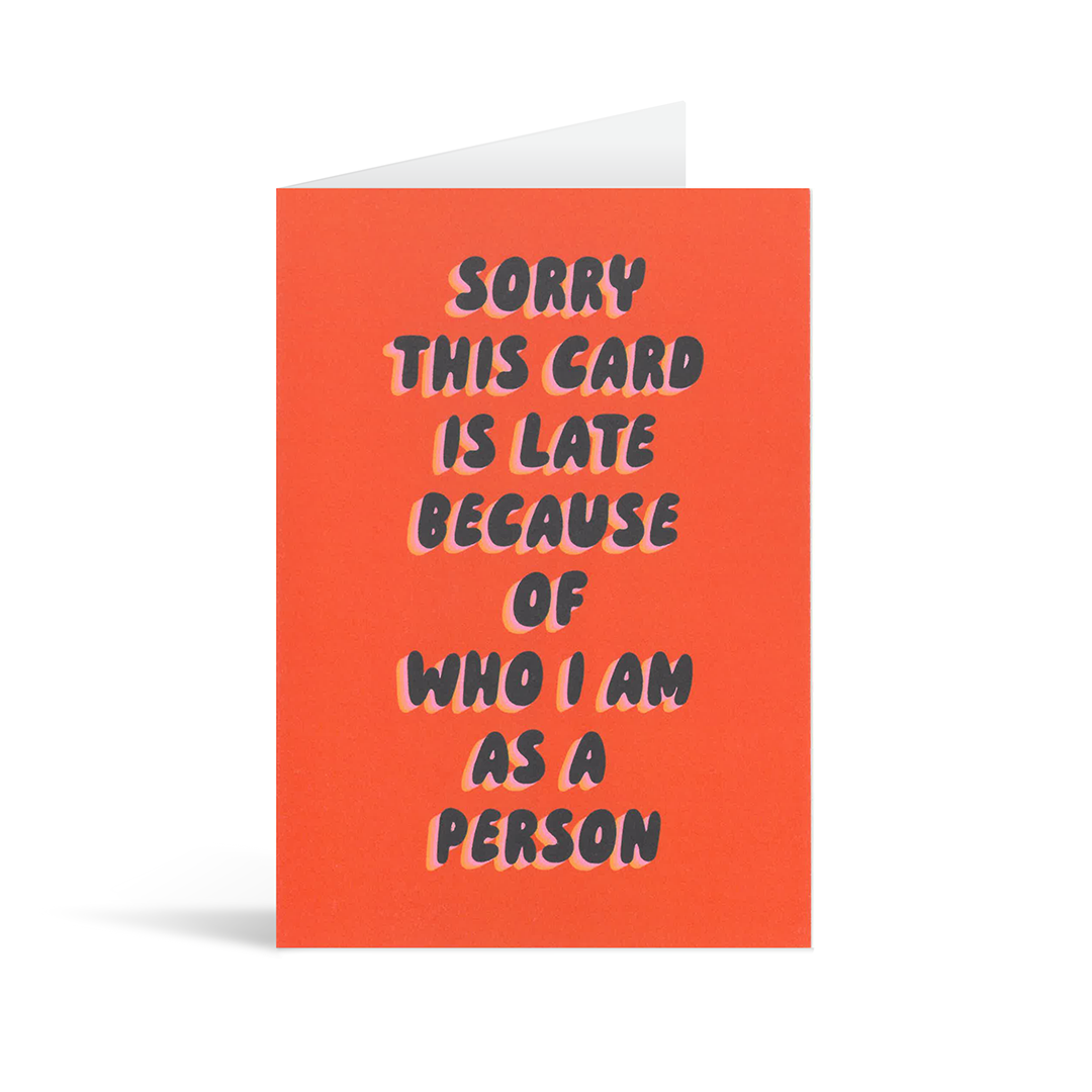 A funny red contemporary card with the text "Sorry this card is late because of who I am as a person"