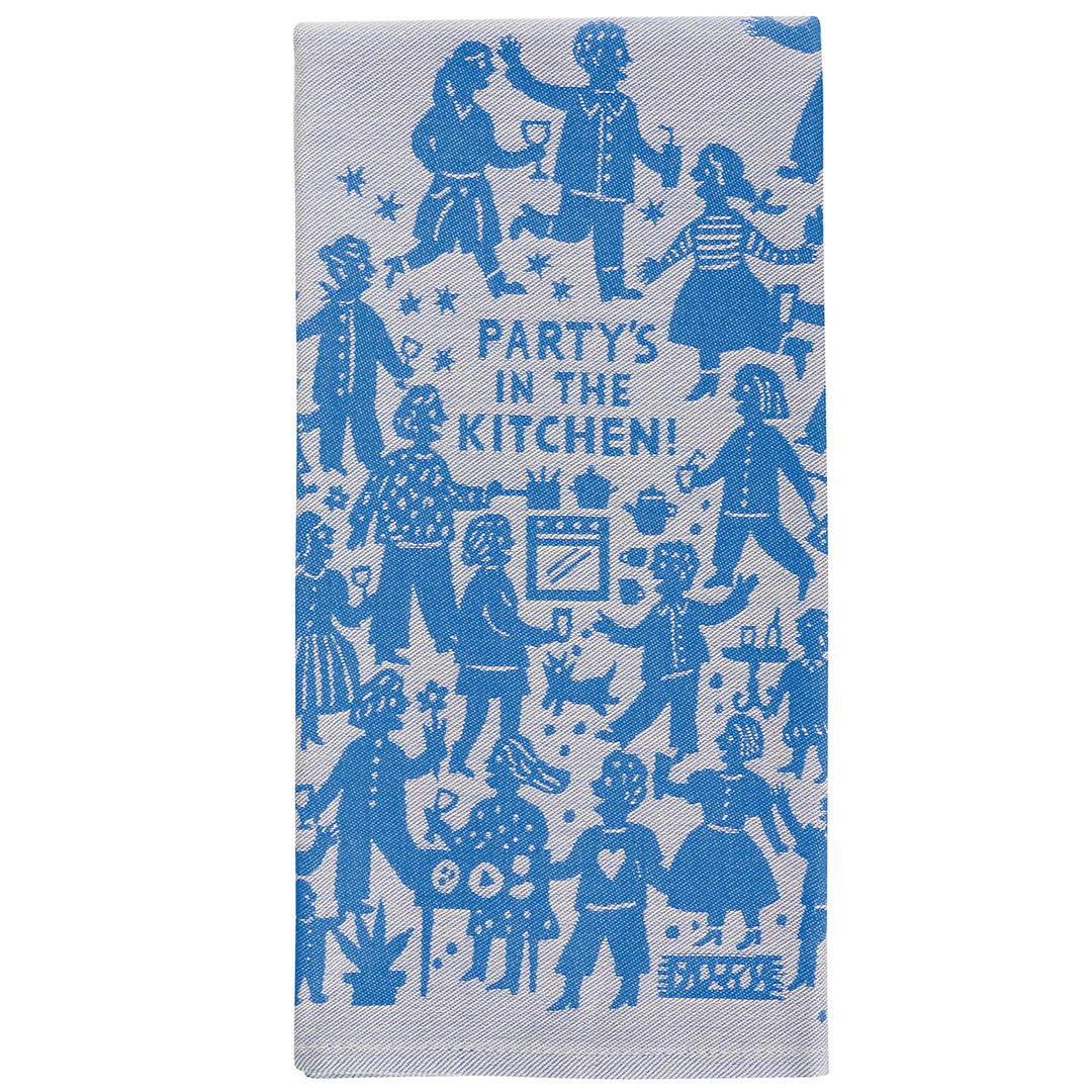 A grey tea towel or dish towel featuring blue figures having a partyaround a cooker and the text "Party's in the kitchen"