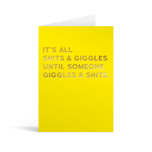 Bright yellow rectangular card with funny gold foiled text saying: "It's all shits & giggles until someone giggles & shits."