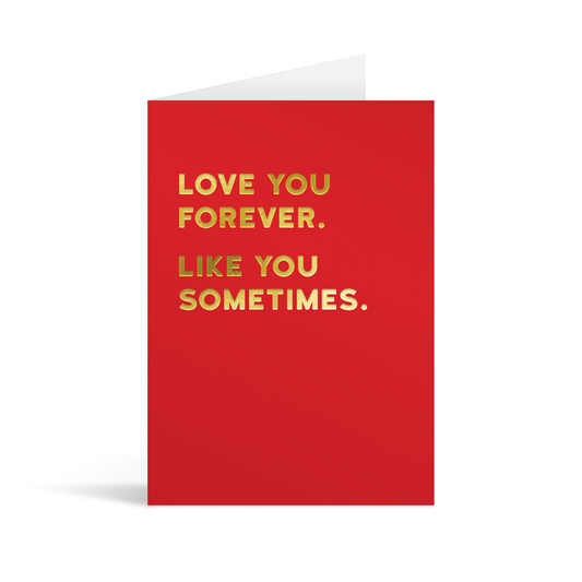 Red card with gold foiled text that reads "Love you forever. Like you sometimes."