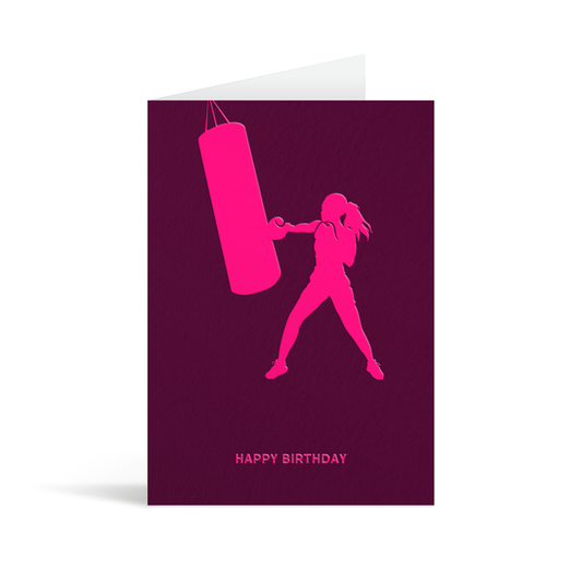 Burgundy card with neon pink sillhouette of a female boxer above text that reads Happy Birthday