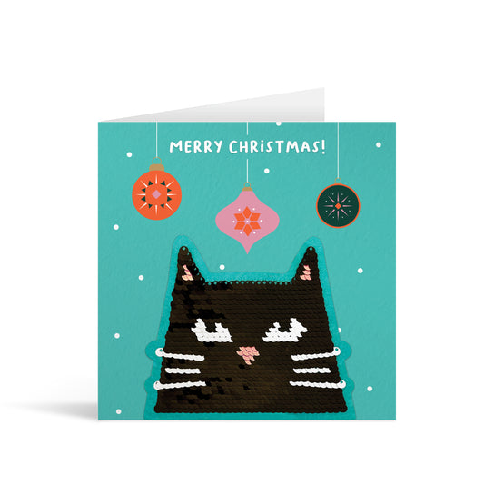 Turquoise square greetings card with colourful reversible sequin cat and baubles patch and fun, free-flowing text that reads "Merry Christmas!"