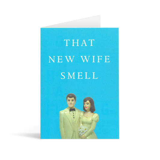 A contemporary bright blue card with two wedding figurines and the text "That new wife smell"