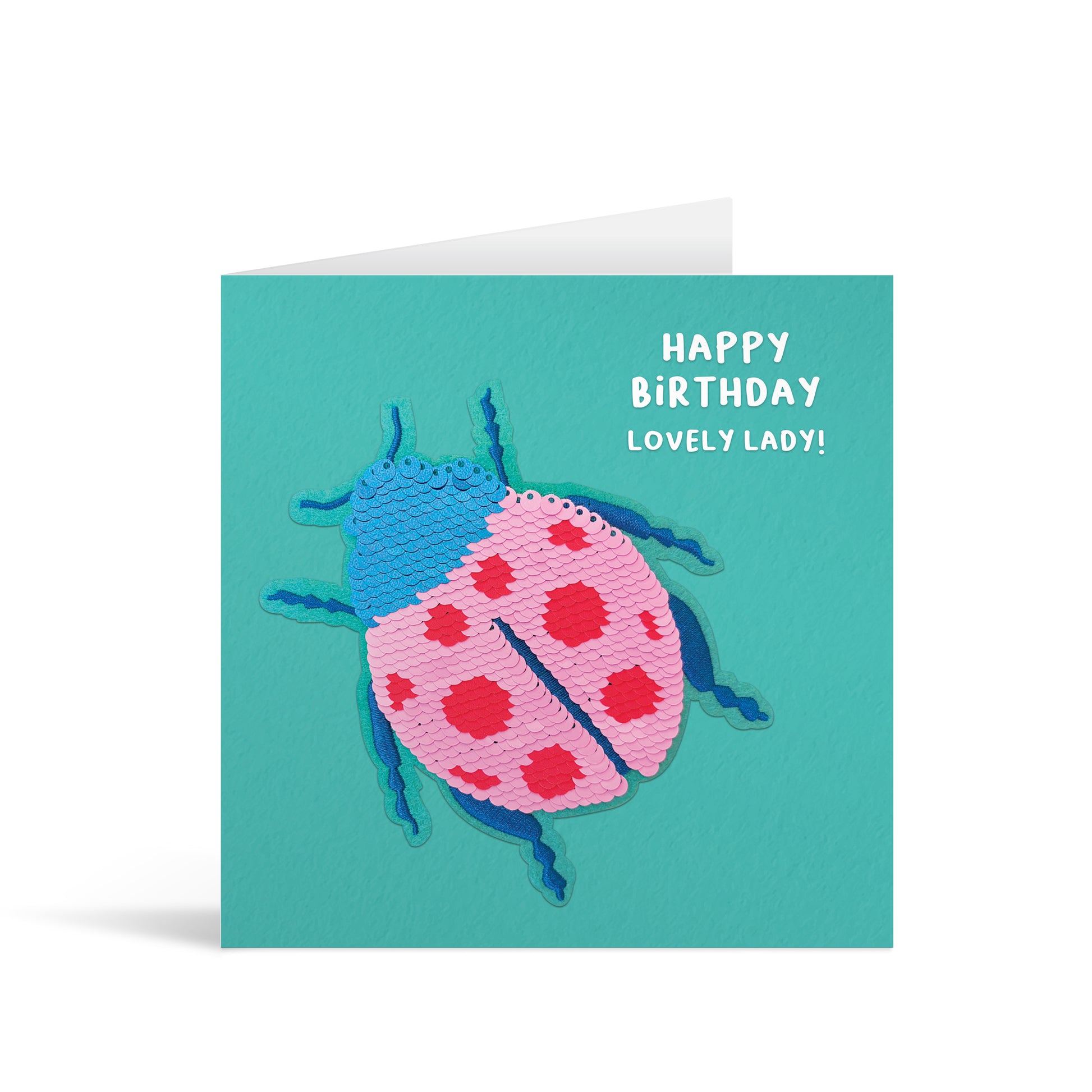 Turquoise square greetings card with colourful reversible sequin ladybird patch and fun, free-flowing text that reads "Happy Birthday Lovely Lady!"
