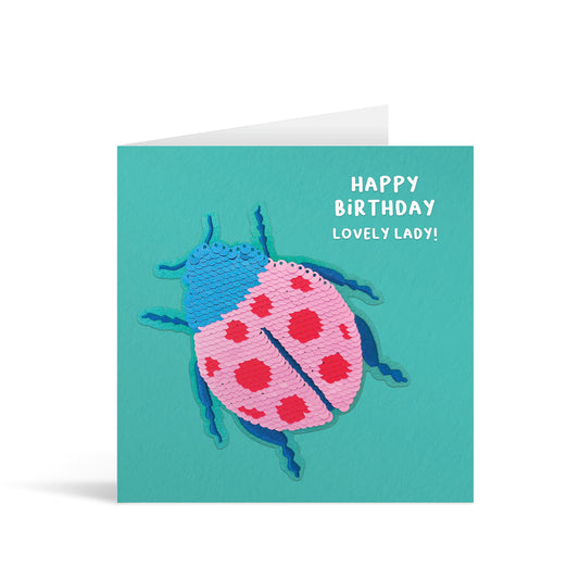 Turquoise square greetings card with colourful reversible sequin ladybird patch and fun, free-flowing text that reads "Happy Birthday Lovely Lady!"