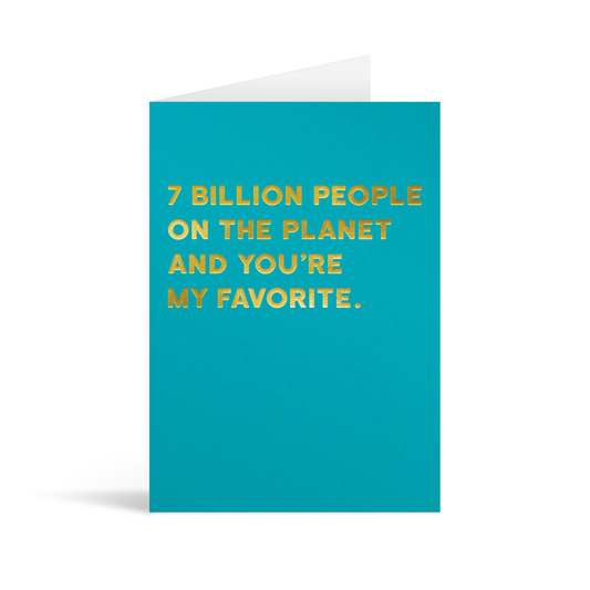 Bright blue rectangular card with funny gold foiled text saying: "7 billion people on the planet and you're my favorite."