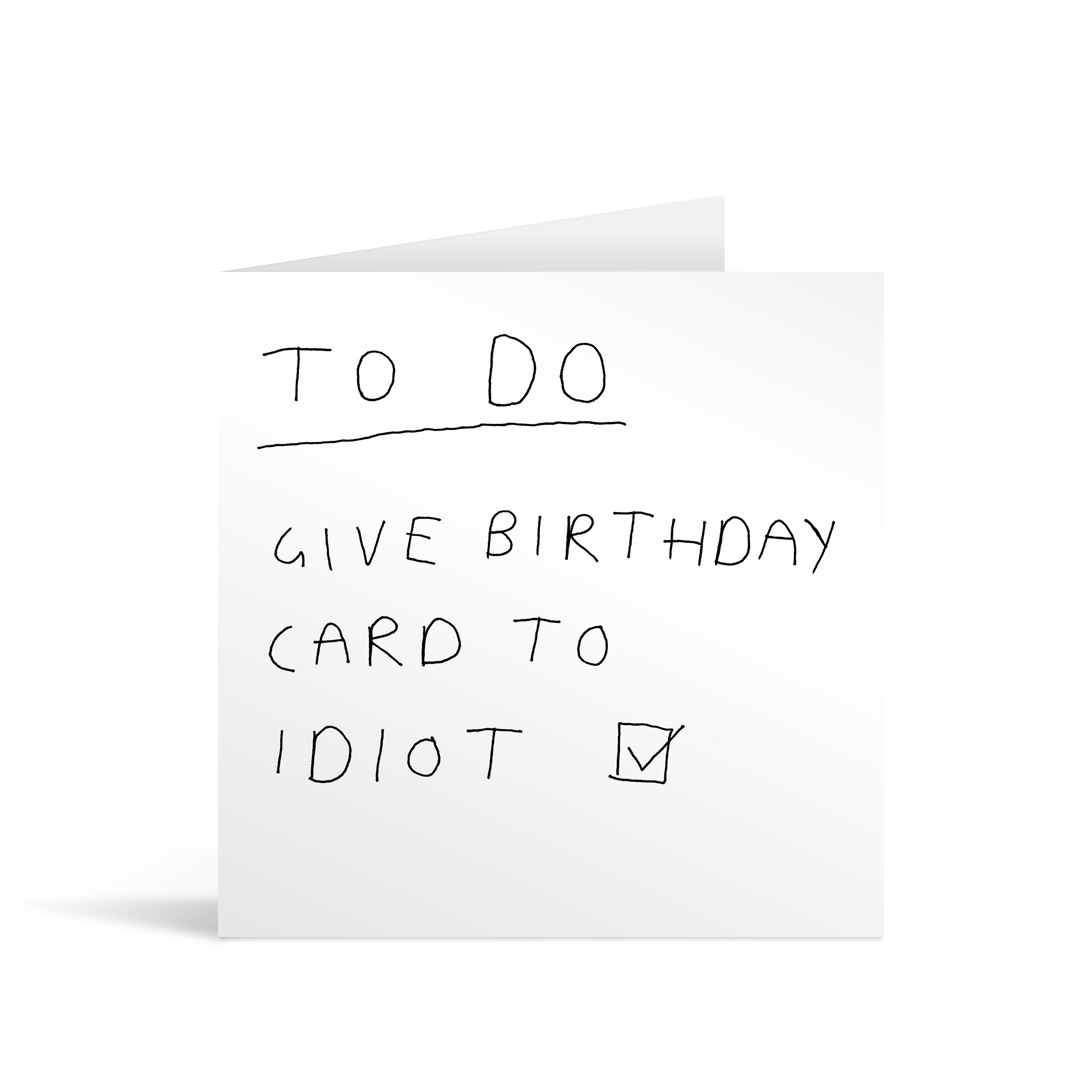 Messy handwritten style card saying: " To do: give birthday card to idiot" with a checked box next to it