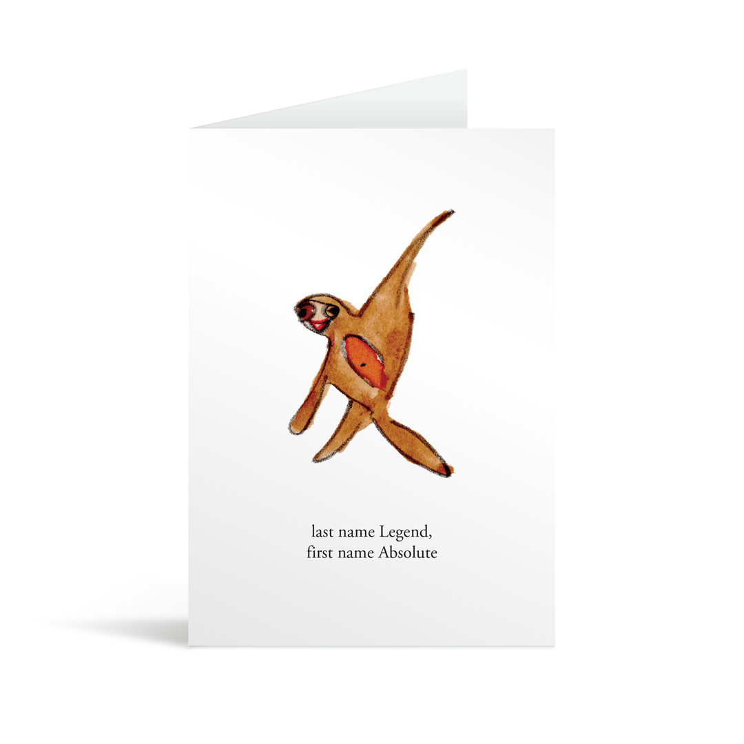 A white rectangular card with a cute hand illustrated sloth with funny text saying "last name Legend, first name Absolute" 