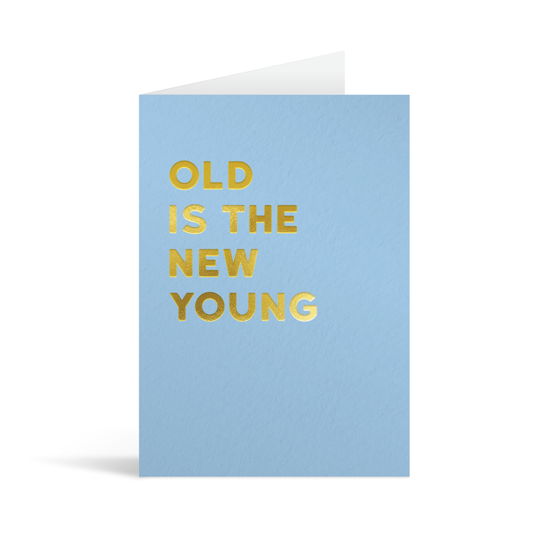 Pastel blue rectangular card with funny gold foiled text saying: "Old is the new young"